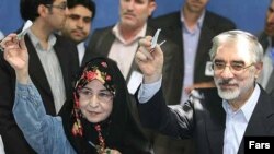 Zahra Rahnavard (left) votes with her husband, Mir Hossein Musavi, at a polling station in southern Tehran in the June 2009 presidential election.