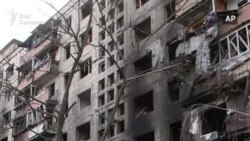 В Киеве снаряд попал в жилой дом