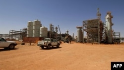 An undated photo of vehicles parked at the In Amenas gas field, jointly operated by British oil giant BP, Norway's Statoil, and state-run Algerian energy firm Sonatrach, in eastern Algeria near the Libyan border.