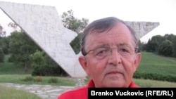 Sixty-two-year-old Rasko Tanasijevic at the Sumarice war memorial in Kragujevac on July 31