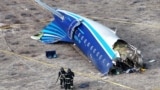 FILE PHOTO: A drone view shows the crash site of a passenger plane near Aktau