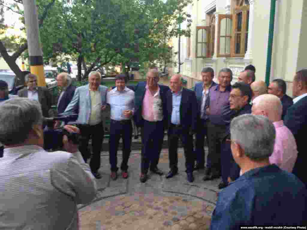 Uzbekistan - uzbek criminal authority Salim Abduvaliev (6th from left) is posing for photo with his friends on his granddaughter's wedding party