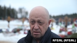 Основатель ЧВК «Вагнер» Евгений Пригожин на похоронах наёмника, 24 декабря 2022 года

