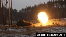 A Ukrainian tank fires at Russian positions near Kreminna in the Luhansk region.