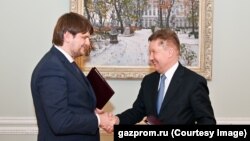 Вице-премьер Андрей Спыну с главой «Газпрома» Алексеем Миллером, октябрь 2021 г.