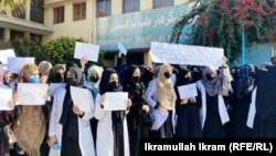 Female Nangarhar University students protest against the Taliban decree on closing women's universities throughout Afghanistan on December 21.