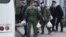 Mobilized men board a bus outside a temporary mobilization station set up at Moscow's Roman Viktyuk Theater at the end of September.