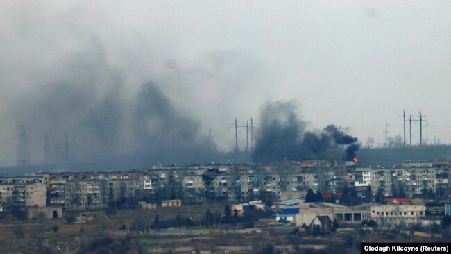 Smoke rises from strikes on the frontline Ukrainian city of Soledar amid Russia's ongoing offensive in eastern Ukraine continues.