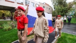 MOSCOW, RUSSIA - SEPTEMBER 26, 2022: Young Army cadets raise the Russian flag before classes at Moscow's secondary school No 444