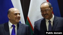 Премьер-министры Узбекистана и России Абдулла Арипов и Михаил Мишустин. 