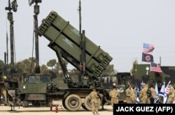 Военные США возле американской системы противоракетной обороны Patriot во время совместных израильско-американских военных учений Juniper Cobra на авиабазе Хацор, Израиль, 8 марта 2018 года