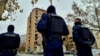 Police patrol the streets of in North Mitrovica on December 9.