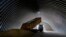 A truck unloads grain in a granary in the village of Zghurivka, Ukraine, on August 9.