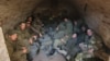 Руски войници, затворени в мазе.
