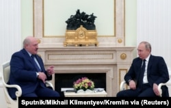 Уладзімер Пуцін слухае Аляксандра Лукашэнку падчас сустрэчы ў Крамлі. Масква, 11 сакавіка 2022