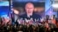 Владимир Путин на экране на Красной площади выступает на митинге и концерте, посвящённых аннексии четырёх регионов Украины, оккупированных российскими войсками. Москва, 30 сентября 2022 года