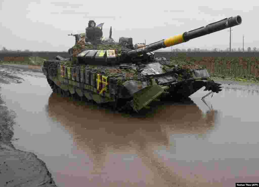 A Ukrainian tank on a waterlogged road in the Kharkiv region in October.&nbsp;