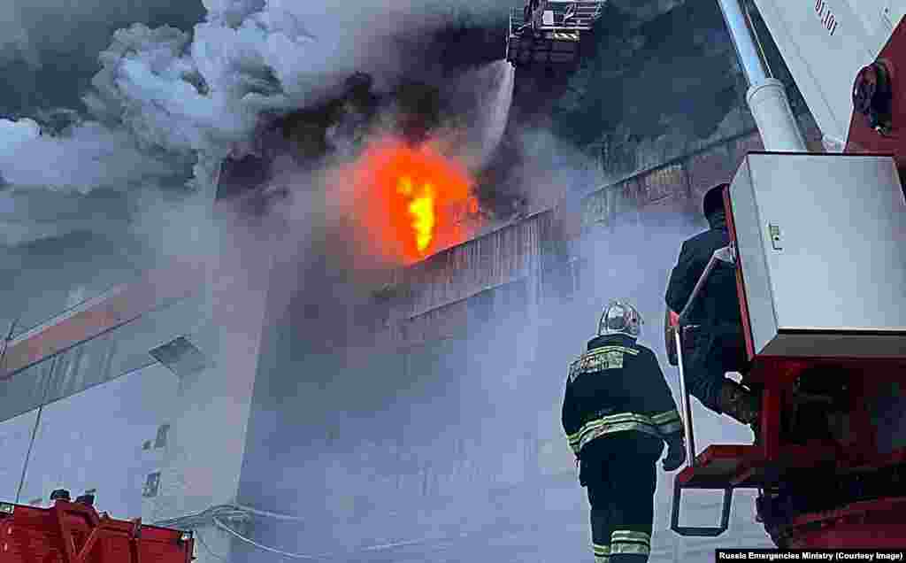 December 9: Firefighters during a blaze at a tire production factory in Barnaul in southern Russia. Local reports suggest the factory would be out of action for around six months. The 1,200 people who worked at the plant have been placed on leave.&nbsp;