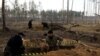 O echipă de la misiunea umanitară „Lalea Neagră” se ocupă de exhumarea cadavrelor soldaților ucraineni căzuți la Yampil. Fotografie făcută pe 2 ianuarie 2023.
