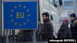 Chechens wait in Bosnia at a border crossing with Croatia on December 27.