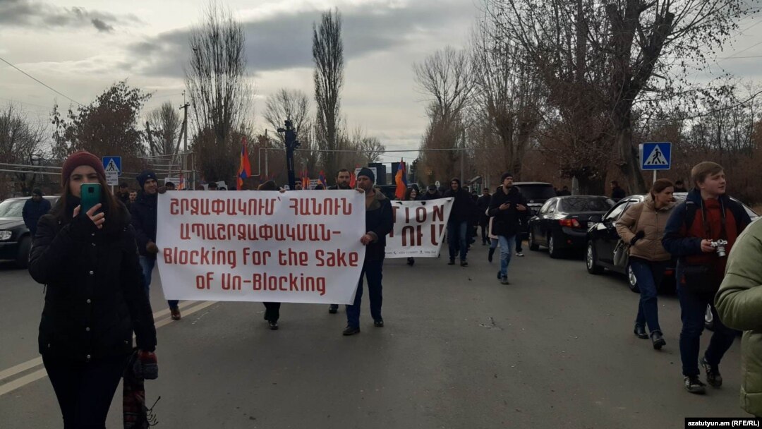 Armenian protesters march near the Russian military base in Gyumri on January 8.