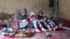 دختران دانش آموز و کارمندان اسبق ادارات در نیمروز به کار خیاطی و صنایع دستی رو آورده اند