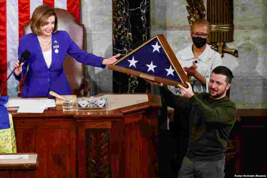 A U.S. flag that had flown over the Capitol building earlier in the day in his honor is presented to Zelenskiy by Pelosi. Zelenskiy concluded his speech with: &quot;Thank you so much, may God protect our brave troops and citizens, may God forever bless the United States of America. Merry Christmas and a happy, victorious New Year.&nbsp;Slava Ukrayini!&quot; (Glory to Ukraine!).