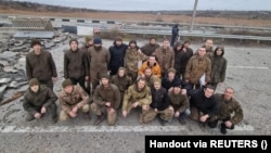 Andriy Yermak , the head of the Ukrainian presidential office, also said that Kyiv has managed to secure the release of 98 Ukrainian prisoners of war in the past week. In this picture, a group of POWs pose after a swap in the Zaporizhzhya region on November 24. 