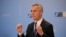 NATO Secretary-General Jens Stoltenberg delivers his speech as he arrives for the first day of the meeting of NATO Ministers of Foreign Affairs in Bucharest, Romania, Tuesday, Nov. 29, 2022.
