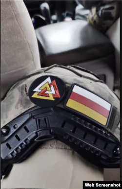 Нашивки на осетинских бойцах. Скриншот видео, опубликованного в официальном телеграм-канале батальонов "Осетия" и "Алания"