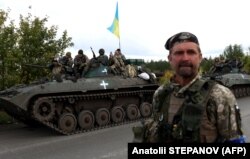 Українські військові на бронетехніці біля міста Ізюму на Харківщині, 24 вересня 2022 року