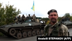 Украинские военные во время освобождения Изюма в Харьковской области, сентябрь 2022 года