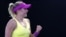 Ukraine's Kateryna Baindl celebrates after winning against Russia's Kamilla Rakhimova in their first round match at the Australian Open tennis championship in Melbourne on January 16. 