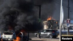  Властите оповестиха за минимум 250 запалени транспортни средства от поддръжниците на картела на 5 януари. 