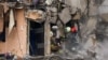 Операция по спасению жильцов разрушенного дома в Днепре после российского ракетного обстрела, январь 2023 года