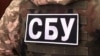 СБУ зазначає, що раніше Сулейманову вже заочно повідомляли про підозру у вбивстві цивільної жительки Київської області через заподіяння їй тяжких тілесних ушкоджень