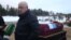 Wagner founder Yevgeny Prigozhin attends the funeral of one of his fighters in December.