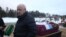 Wagner founder Yevgeny Prigozhin attends the funeral of one of his fighters in December. "Вагнер" басшысы Евгений Пригожин жауынгерін жерлеу рәсімінде. 2022 жылғы желтоқсан.