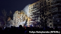 Многоквартирный дом в Днепре, разрушенный российской ракетой. 14 января 2023 года