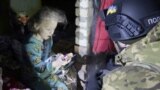 Ukrainian Police Deliver Holiday Gifts In Besieged Bakhmut 