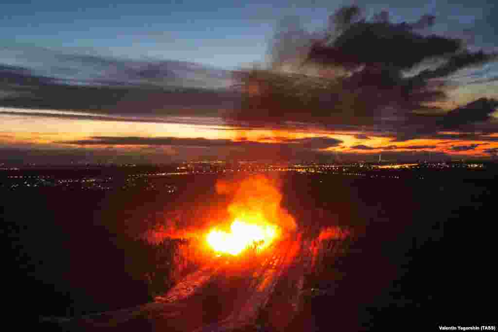 November 19: A fireball engulfs a gas pipeline in a forested area just outside St. Petersburg. Video that captured the outbreak of the blaze shows an explosion and fireball that could clearly be seen from the center of the city.&nbsp;