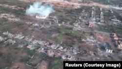 Smoke rises from a missile strike on the town of Soledar on January 13. Multiple reports suggest that Russian forces have nearly taken the town, which is being described as "scorched earth." 