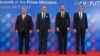 From left: Prime ministers Viktor Orban of Hungary, Petr Fiala of the Czech Republic, Eduard Heger of Slovakia, and Mateusz Morawiecki of Poland pose for a photo after a Visegrad Group summit in Kosice, Slovakia, on November 24.