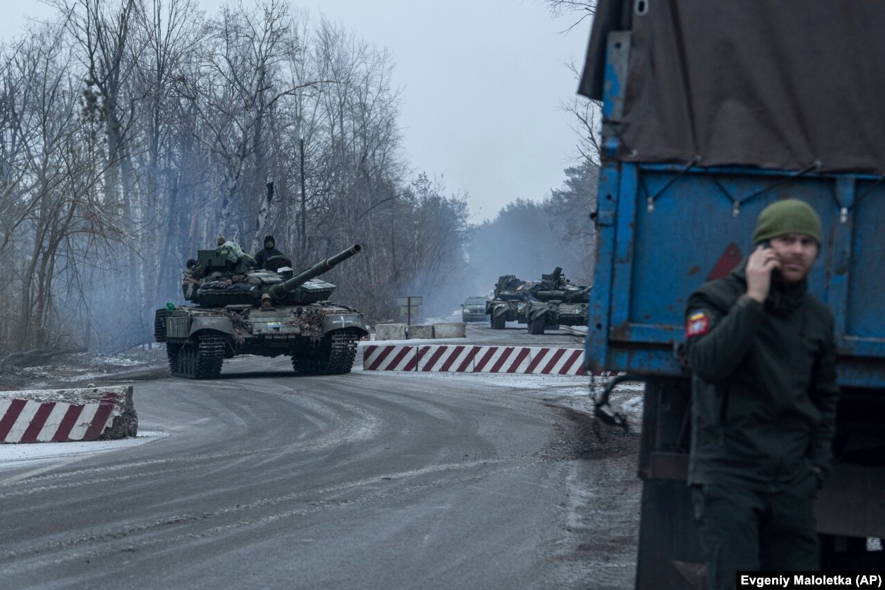 Ukrainian tanks roll toward the front line in the Donetsk region. Ukrainian troops are defending Bakhmut&#39;s northern, eastern, and southern approaches against Russian forces, who are launching ferocious attacks to seize territory that some analysts say is of no strategic military value.