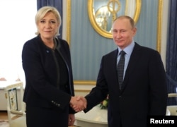 Marine Le Pen primită la Kremlin de președintele rus Vladimir Putin în anul alegerilor prezidențiale din Franța, Moscova, 24 martie 2017.