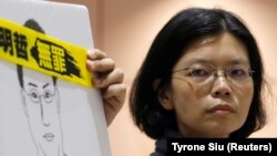 Lee Ching-yu, supruga tajvanskog aktiviste za ljudska prava Lee Ming-chea, na povratku iz Kine gde je bila da poseti supruga u zatvoru, Međunarodni aerodrom Taoyuan, 28. mart 2018. 