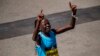 Peres Jepchirchir of Kenyan crosses the finish line after taking first in the womens division in the 126th Boston Marathon on April 18.