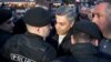 Armenia - Opposition leader Artur Vanetsian argues with a police officer in Liberty Square, Yerevan, April 17, 2022.