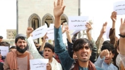 Afghans protest on April 18 against Pakistan's air strikes in Khost and Kunar provinces.
