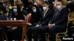 The mayor of the Ukrainian city of Melitopol, Ivan Fedorov (second from right), along with members of the Ukrainian parliament -- Maria Mezentseva, Olena Khomenko, and Rustem Umerov -- in St. Peter's Basilica at the Vatican on April 16.